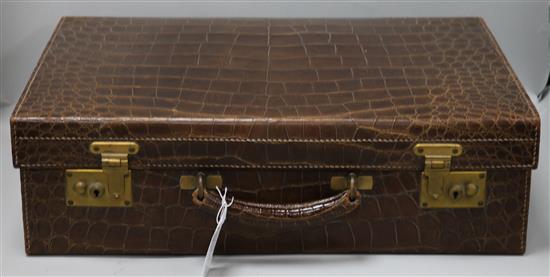 A crocodile suitcase 1920s-30s